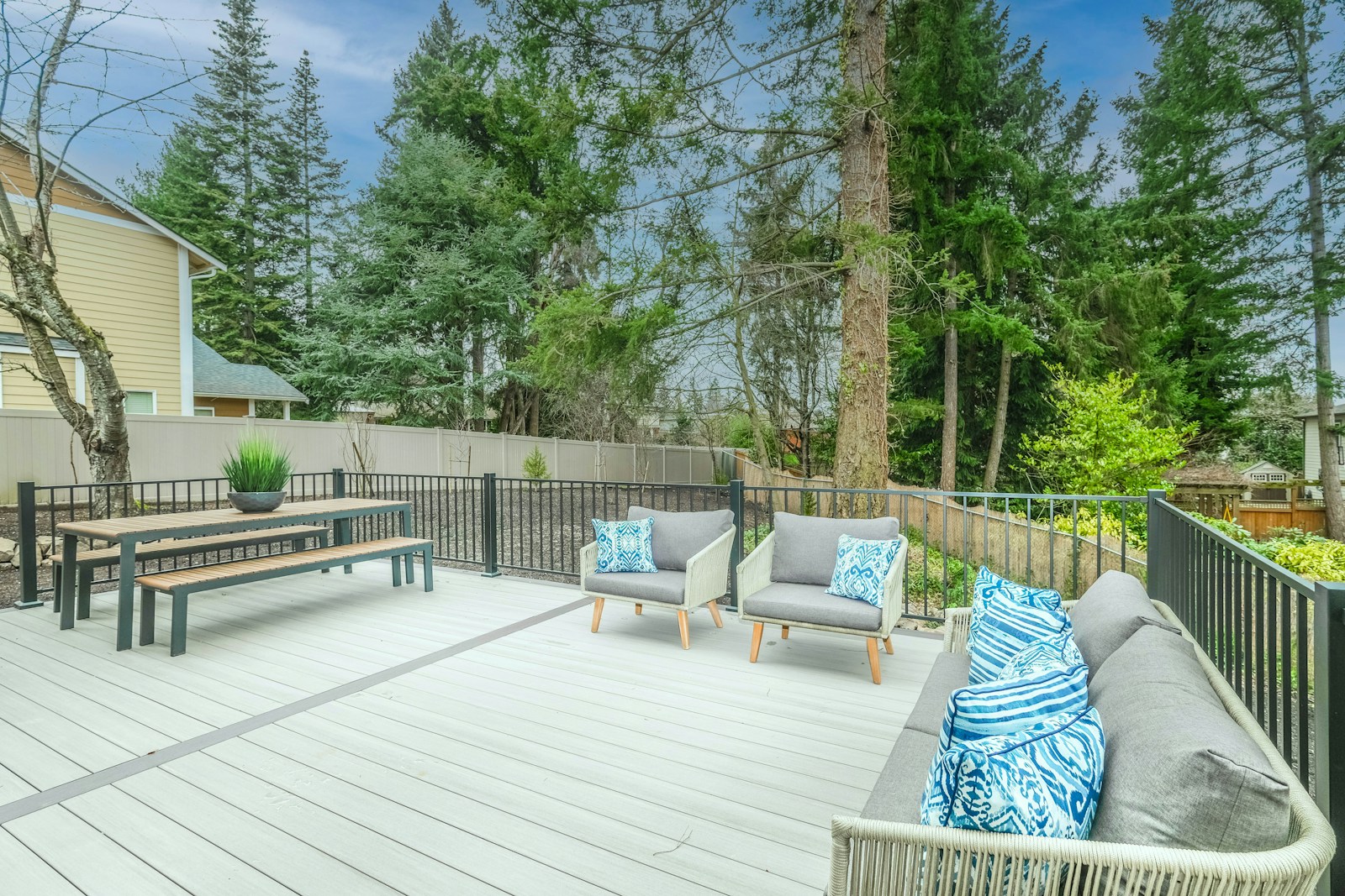 Composite-style deck surface with modern outdoor seating